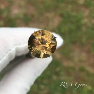 Citrine colored gemstone faceted in oval design